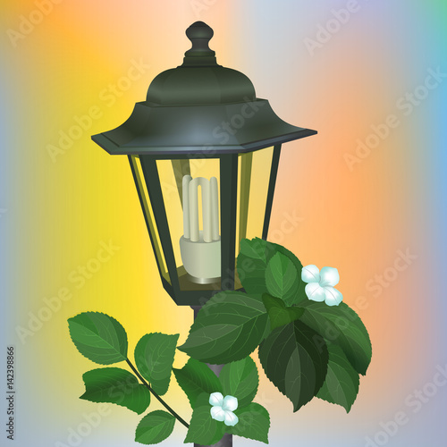 Street lantern from the forged metal with energy saving luminescent lamp