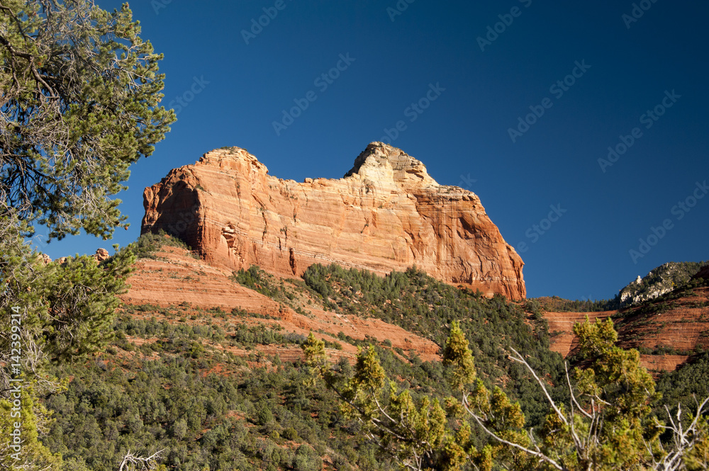Butte at Oak Creek Canyon, Arizona on a sunny day with a blue sky
