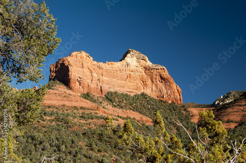 Butte at Oak Creek Canyon, Arizona on a sunny day with a blue sky