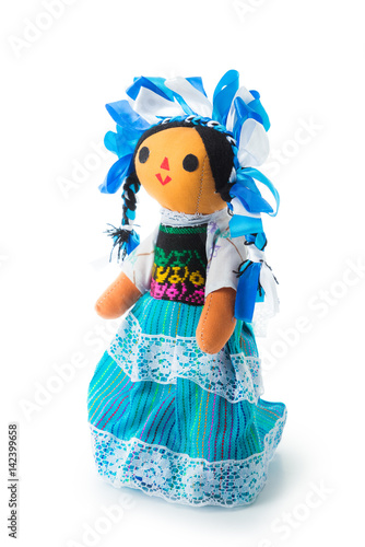 traditional handmade mexican doll isolated on white