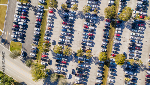 Aerial overhead view of big and crowded car parking