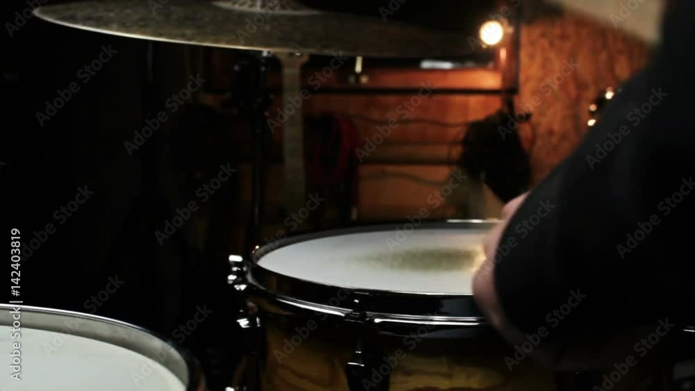Drummer Playing Drums and Cymbals in Music Studio Drummer Playing Drums and Cymbals in Music Studio