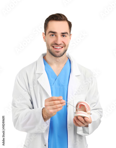Handsome young dentist with...