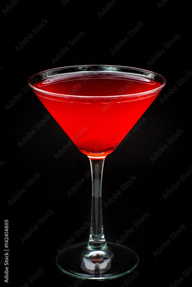 red cocktail on black background red cocktail on black background