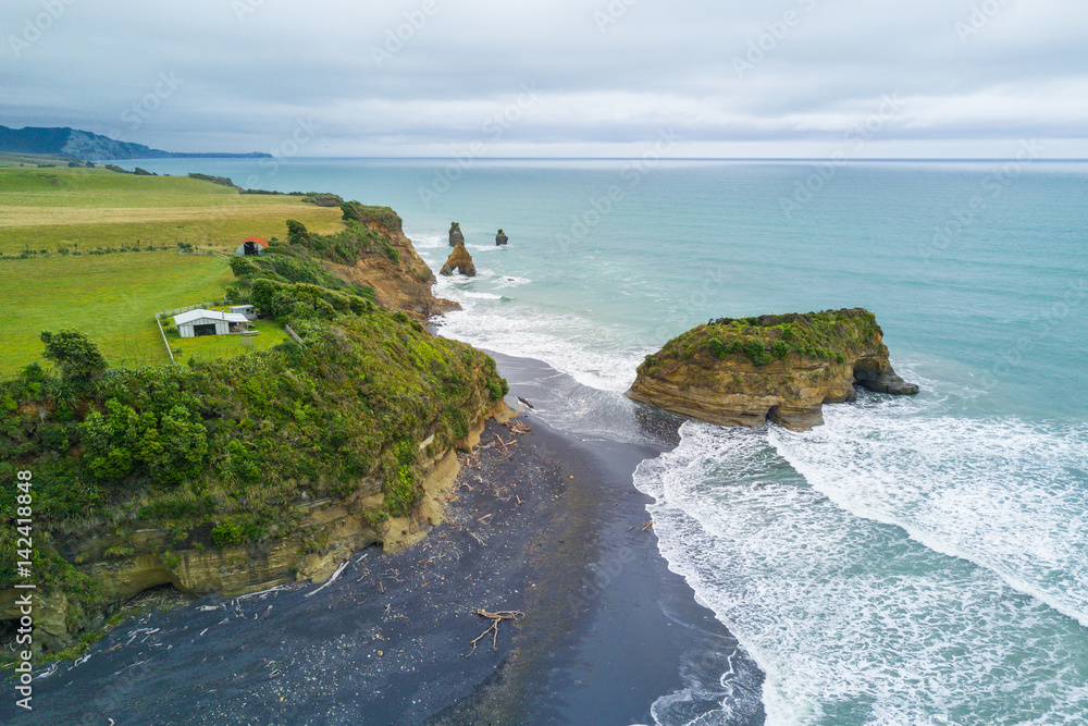 Aerial Shot of The Three Sisters and Elephant Rock, Taranaki, New Zealand.