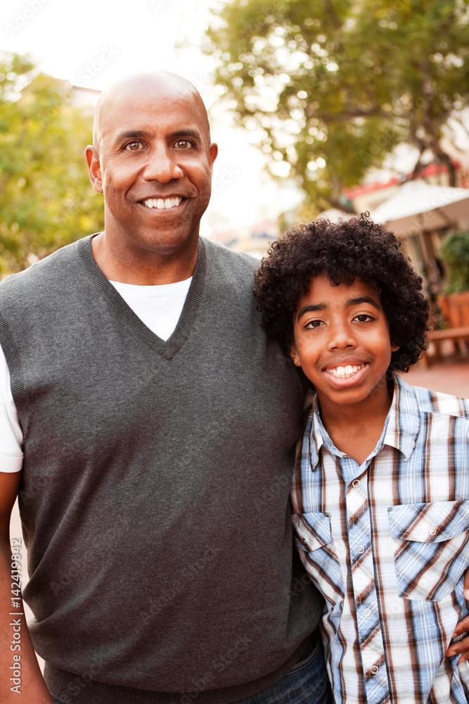 African American father and son spending time together. African American father and son spending time together.