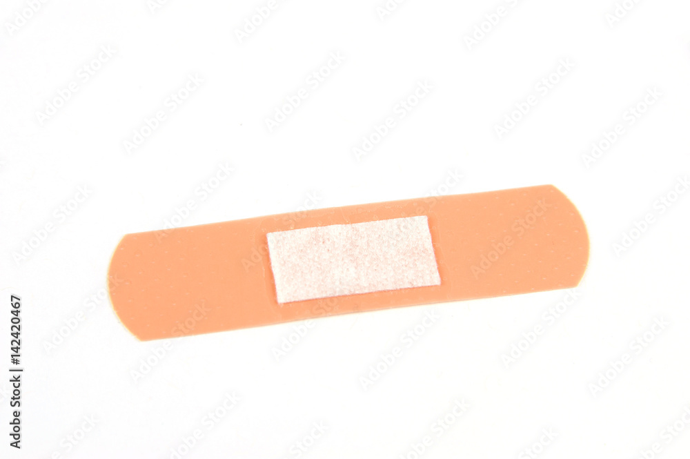 Single adhesive bandage isolated on white background Single adhesive bandage isolated on white background