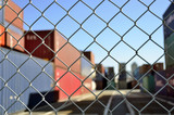 Wire mesh fence enclosing the container yard
