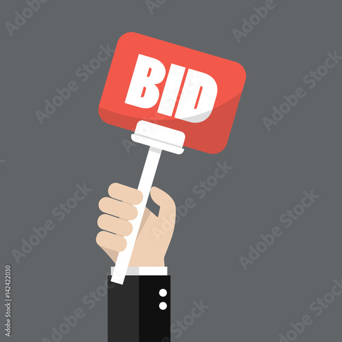 Hand holding auction paddle
