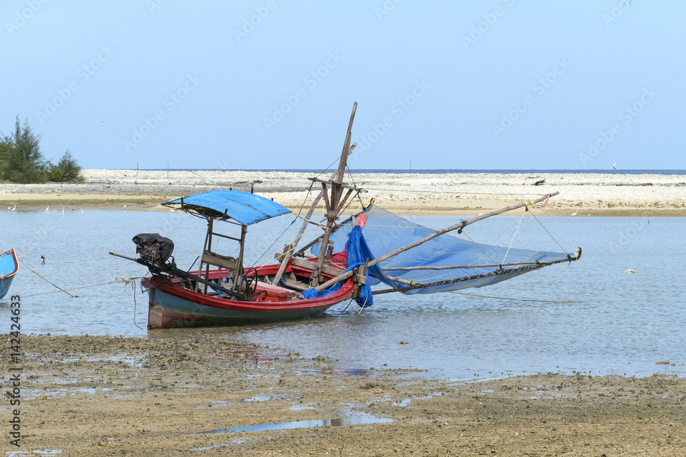 Fishing boat on shore in Thailand