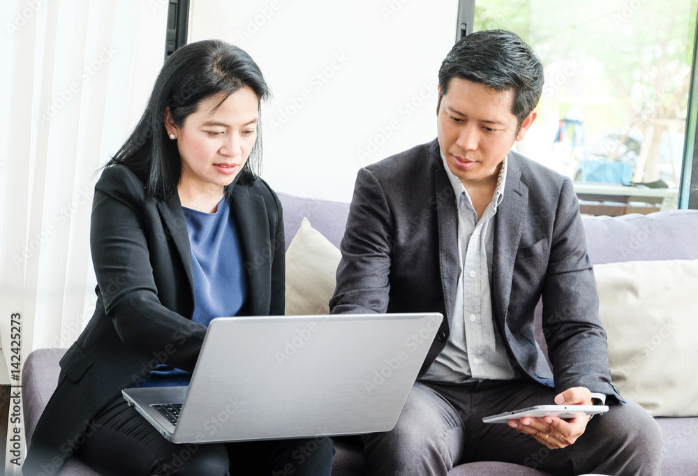 Business man and woman meeting and working at office, business team concept Business man and woman meeting and working at office, business team concept