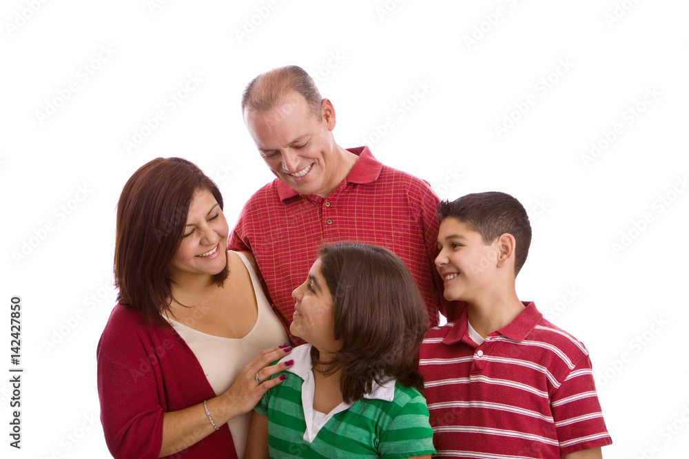 Happy family portrait smiling together - isolated on white background. Happy family portrait smiling together - isolated on white background.