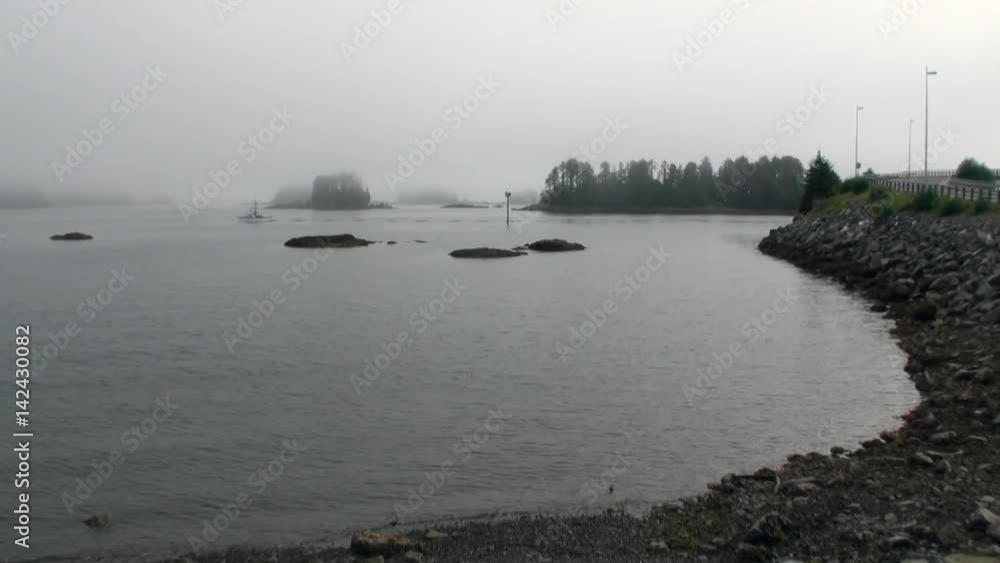 custom made wallpaper toronto digitalYacht sails on calm water of Pacific Ocean on background coast road in Alaska. Amazing landscapes in the fog. Beautiful rest and tourism in a cool climate. Unique picture of nature in America.