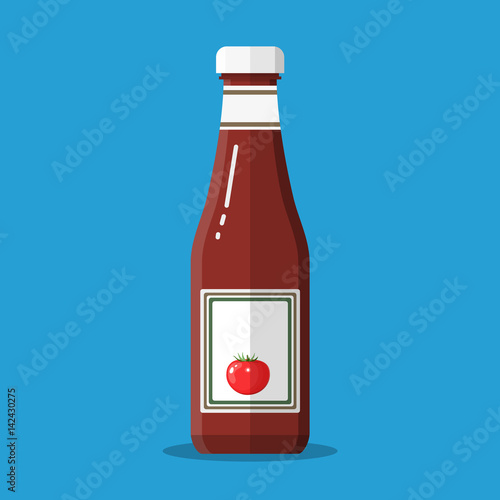 Glass bottle of traditional tomato ketchup.