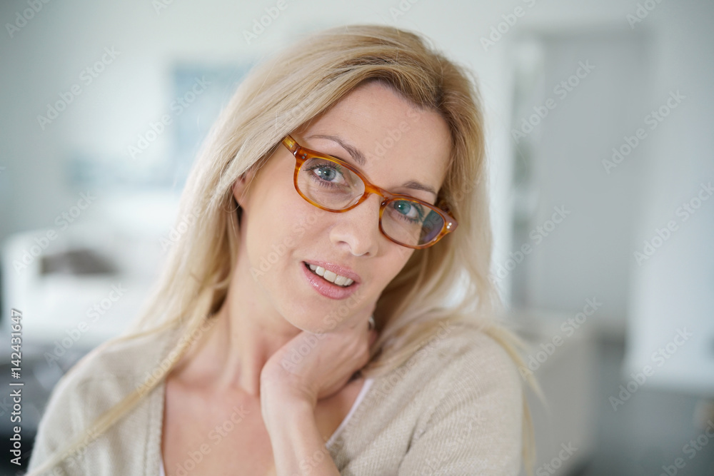 Portrait of beautiful blond woman with eyeglasses Portrait of beautiful blond woman with eyeglasses