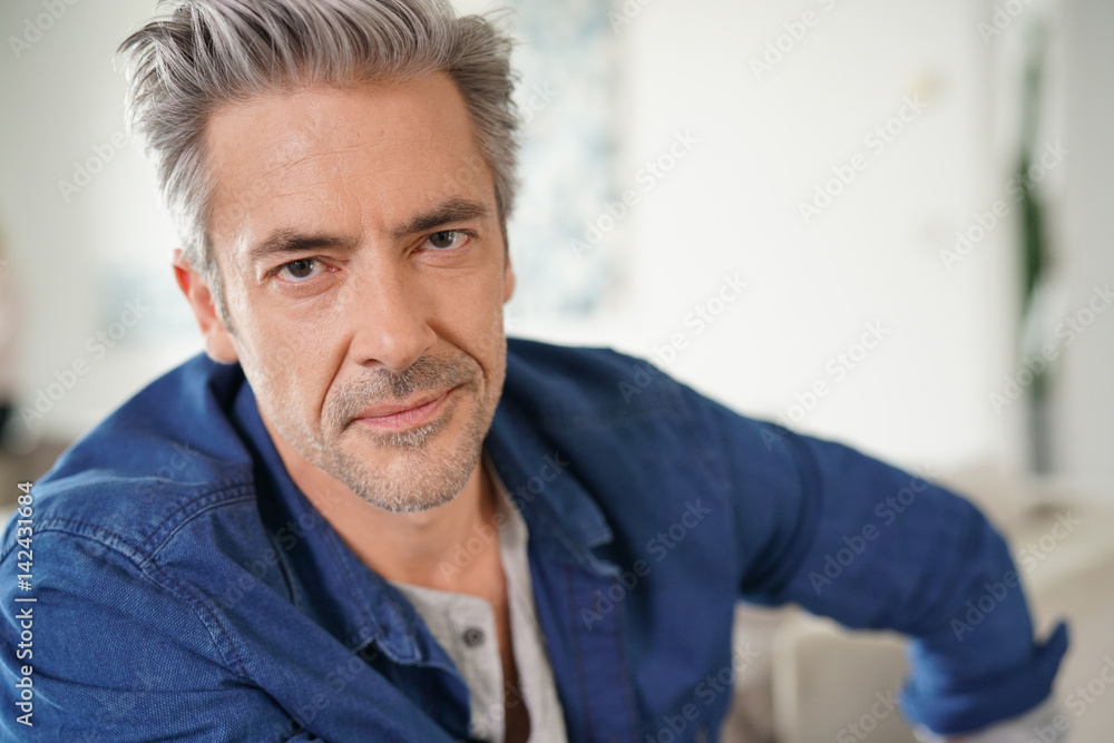 Portrait of mature man relaxing at home Portrait of mature man relaxing at home