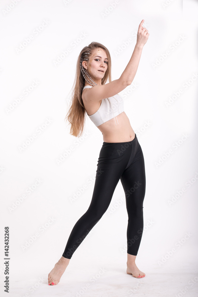 Slim sporty girl with long blond hair