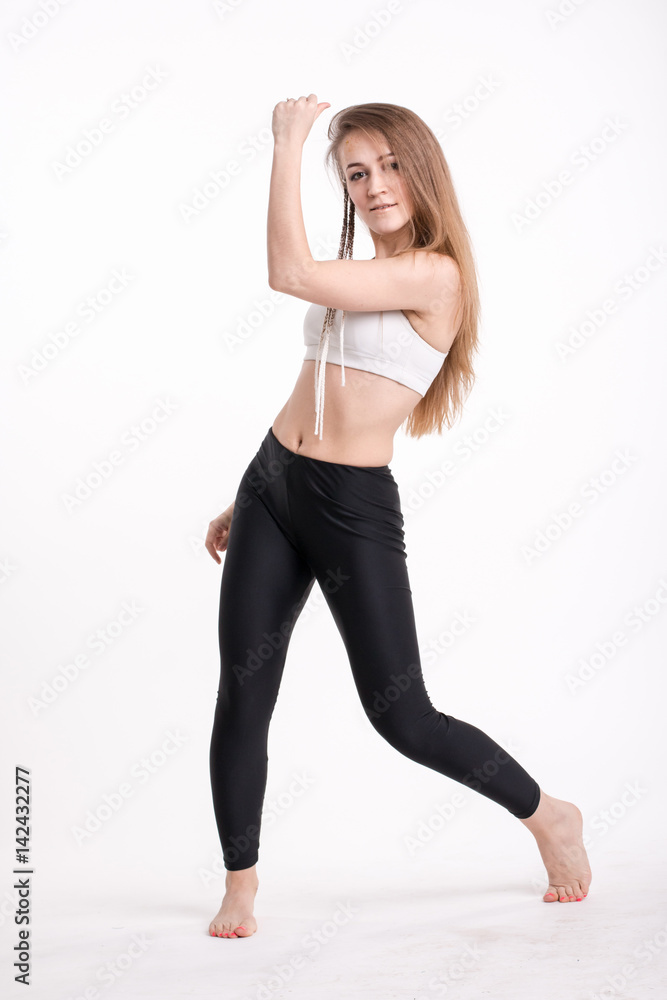 Slim sporty girl with long blond hair Slim sporty girl with long blond hair