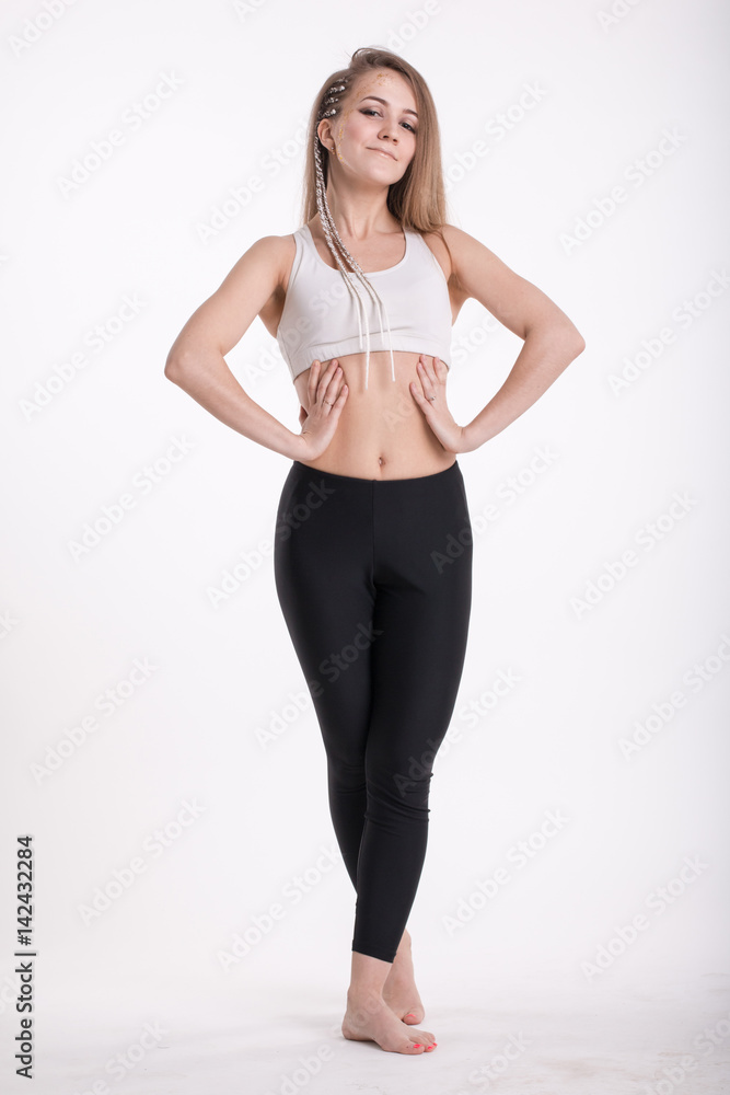Slim sporty girl with long blond hair Slim sporty girl with long blond hair