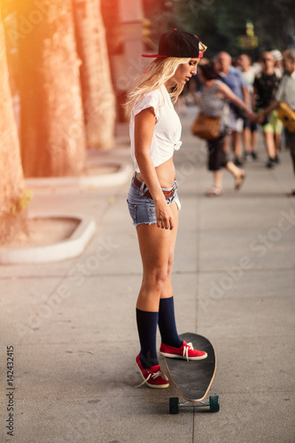 attractive young woman skating