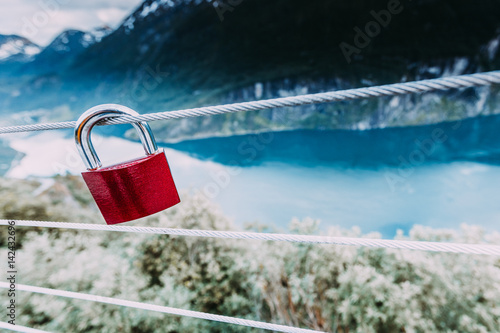 Red padlock and Geirangerfjord from Flydasjuvet viewpoint Norway photo