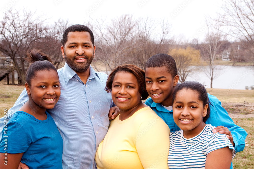 African American family and their children. African American family and their children.