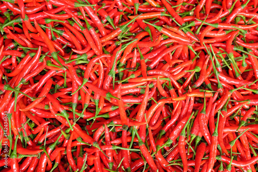 Red fresh chillies background