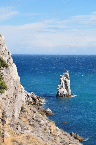 Rock in the blue ocean