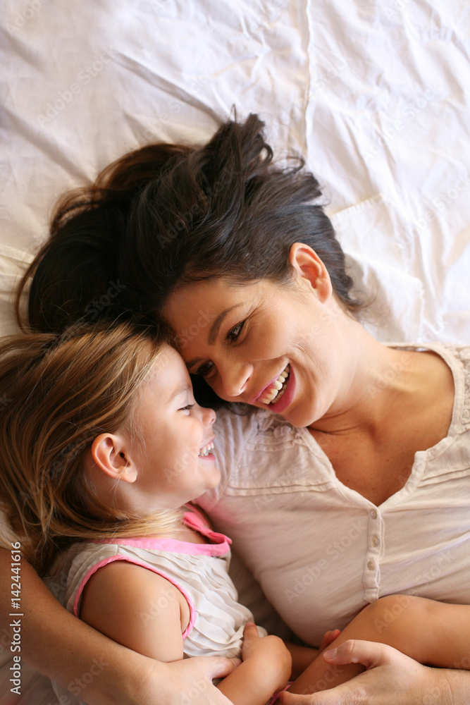 Young mother with her daughter. Young mother with her daughter.