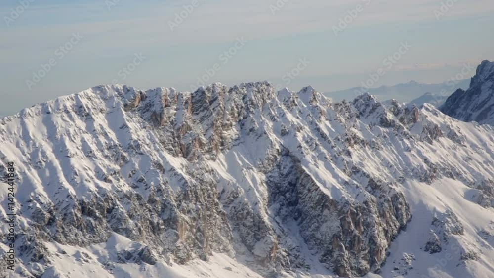 Video Stock Aerial View of a Snow-Capped Ridge in the Eastern Alps on ...