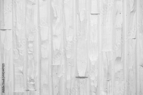 Fotografie White textured stonewall