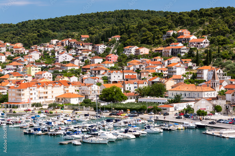 Birds view of the bay of adriatic resort Shibenic. Yachts in harbor and red roofs of houses, of old mediterranean town.