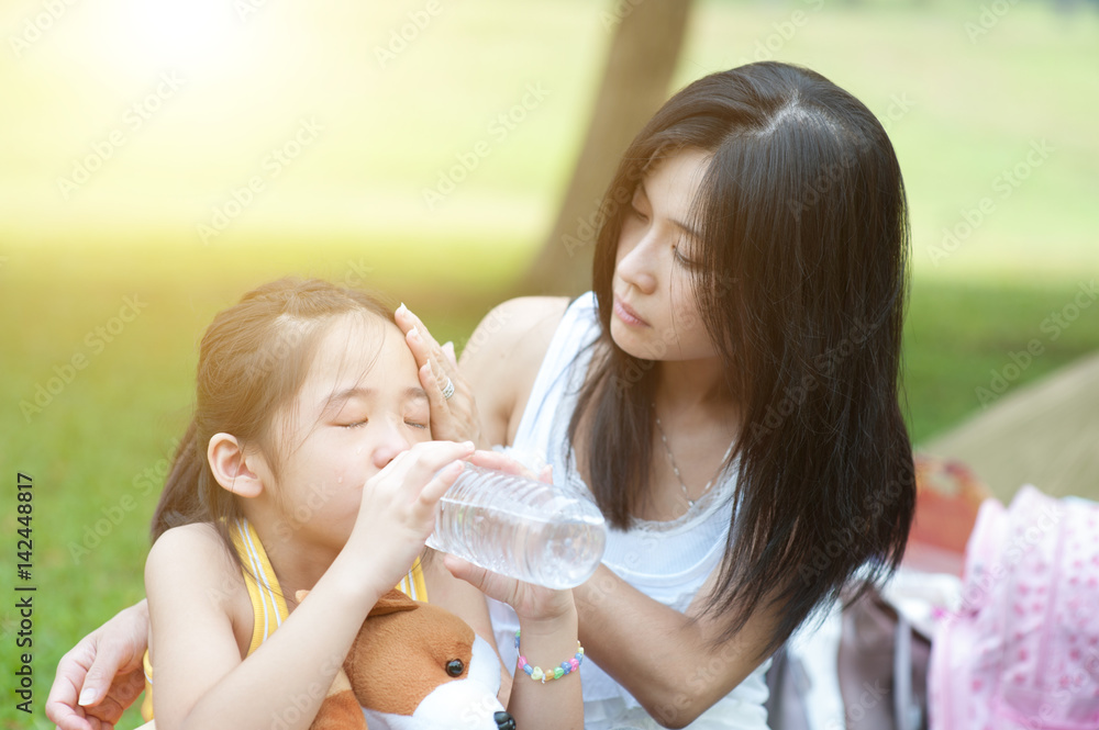 Mother comforting child. Mother comforting child.