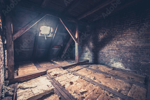 Foto old garret, attic loft / roof construction