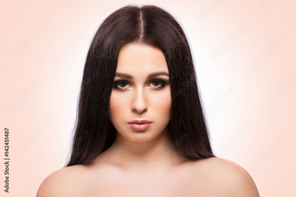 Beauty woman face portrait with clean fresh skin, long hair and bright evening make up. Beauty woman face portrait with clean fresh skin, long hair and bright evening make up.