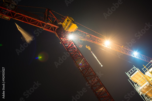 Crane at night photo