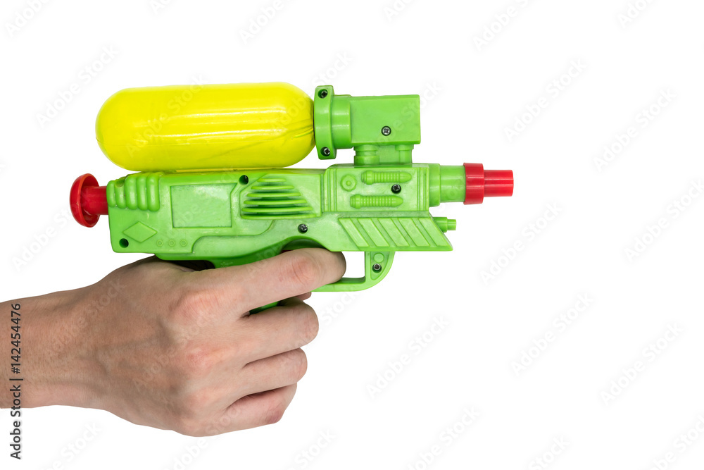 Hands holding gun water toy on white background. Hands holding gun water toy on white background.