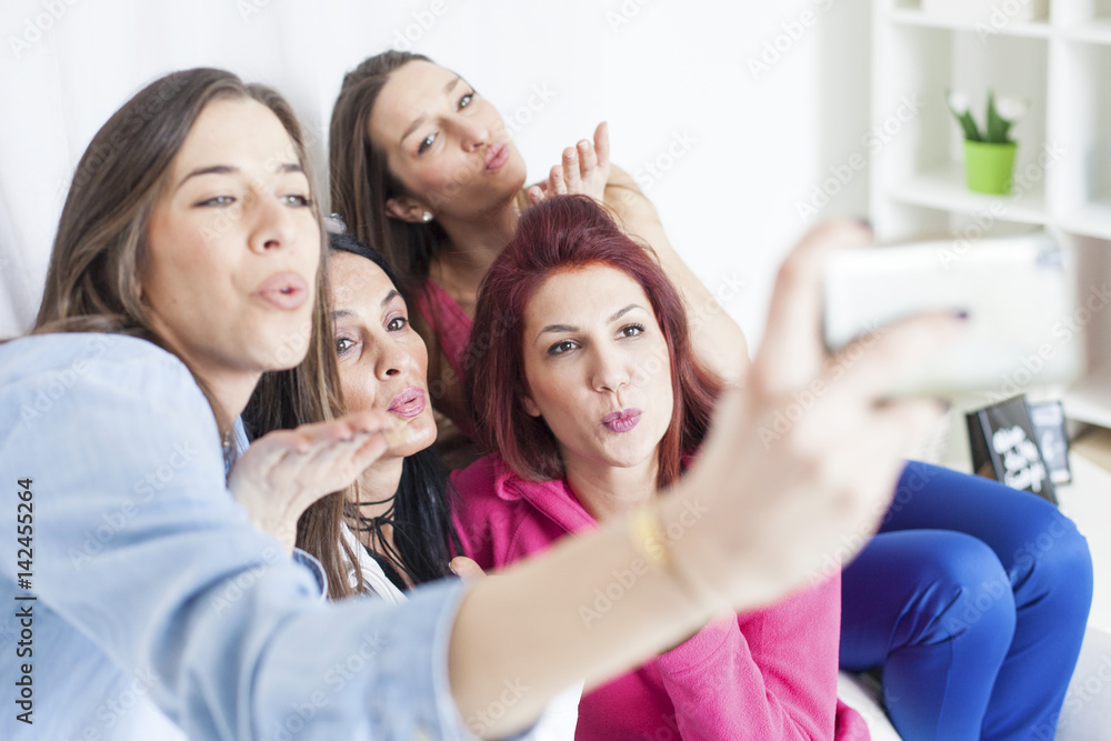 4 beautiful women having fun and taking selfie 4 beautiful women having fun and taking selfie
