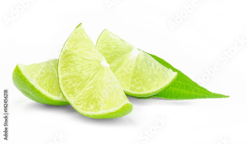 Fresh lime wedges isolated on a white background