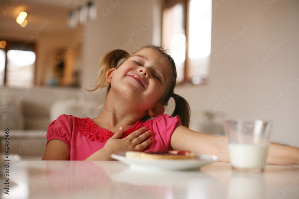 Girl having breakfast. Girl having breakfast.