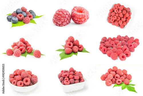 Group of raspberries with leaves isolated on a white background cutout