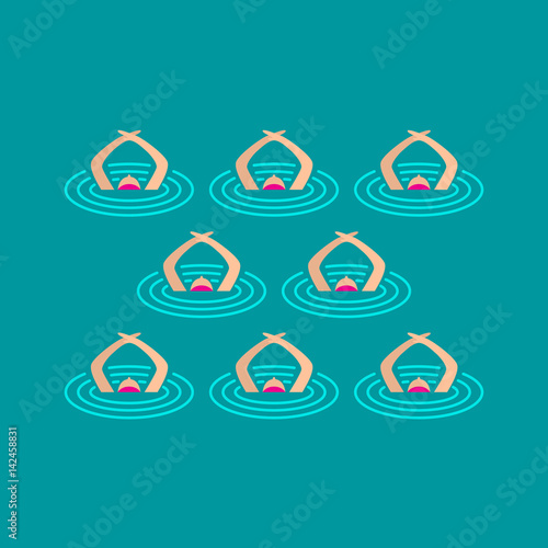 Woman athlete on the performance of synchronized swimming performing art elements