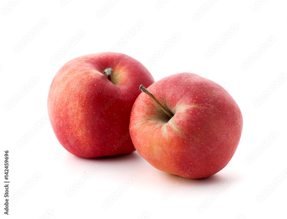 Two red ripe apples on a white background.. Two red ripe apples on a white background..