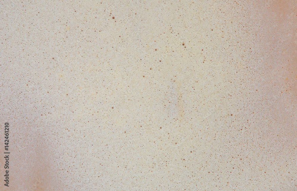 Macro of coffee froth as background texture. Close-up of coffee froth Macro of coffee froth as background texture. Close-up of coffee froth