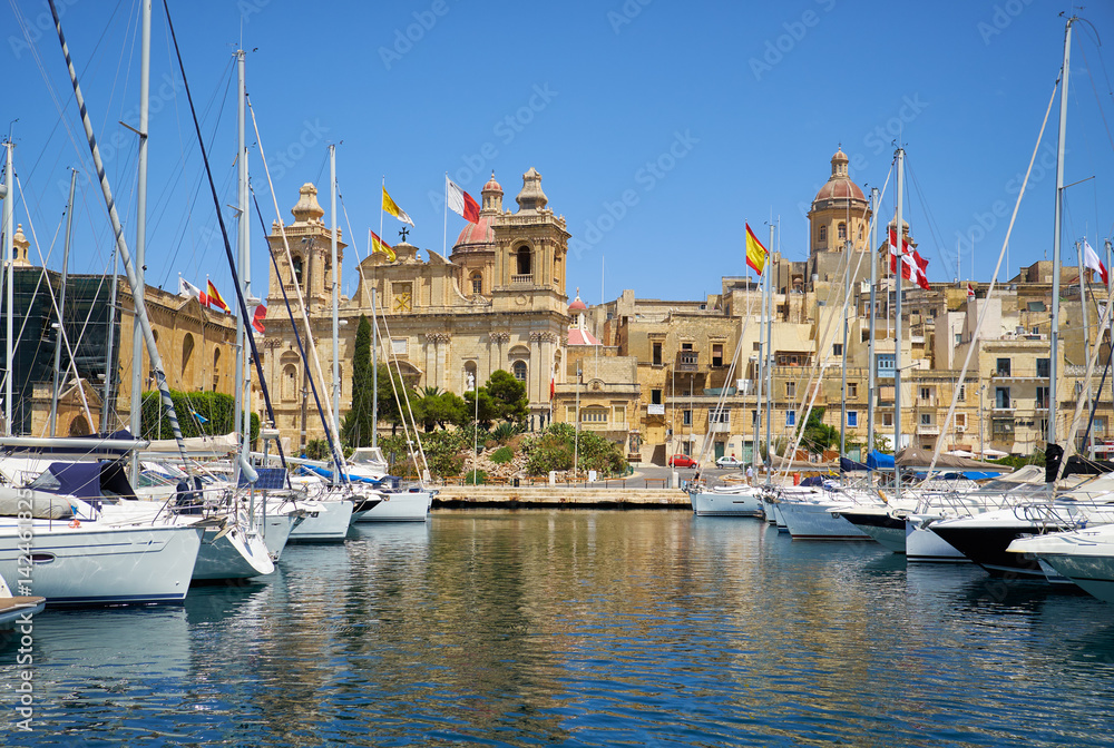 The yachts and boats moored in the harbor in Dockyard creek. Birgu. Malta