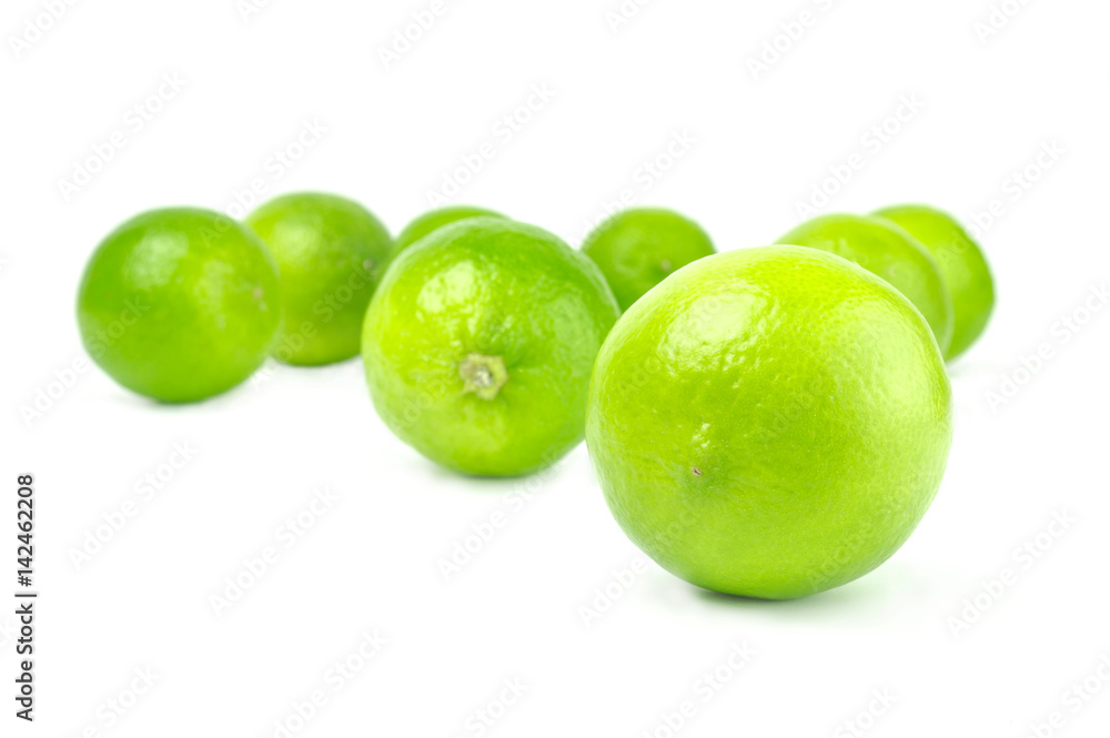 Scattered fresh limes isolated on white background cutout Scattered fresh limes isolated on white background cutout