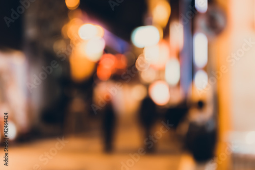 Abstract bokeh background of people at lan kwai fong on friday night  photo