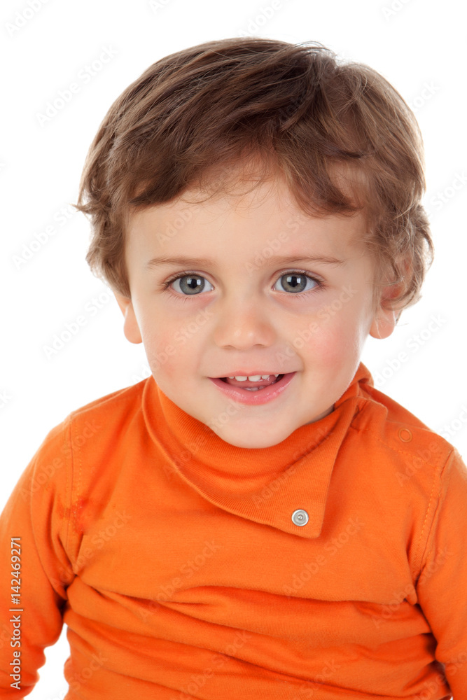 Beautiful little child two years old with orange jersey Beautiful little child two years old with orange jersey