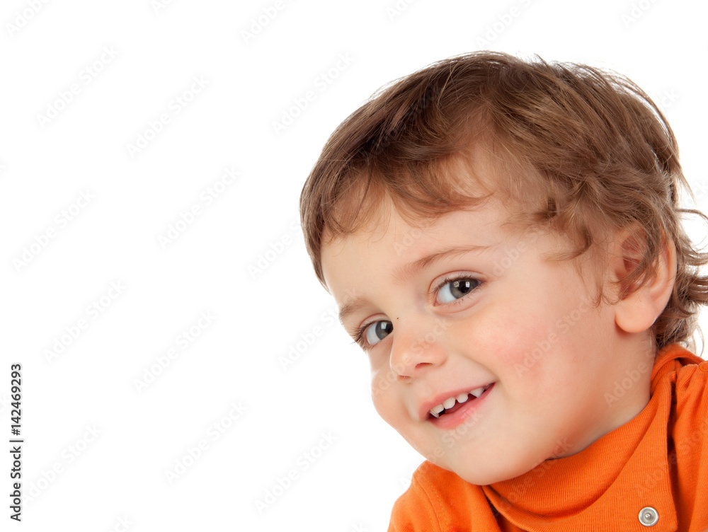 Beautiful little child two years old with orange jersey Beautiful little child two years old with orange jersey
