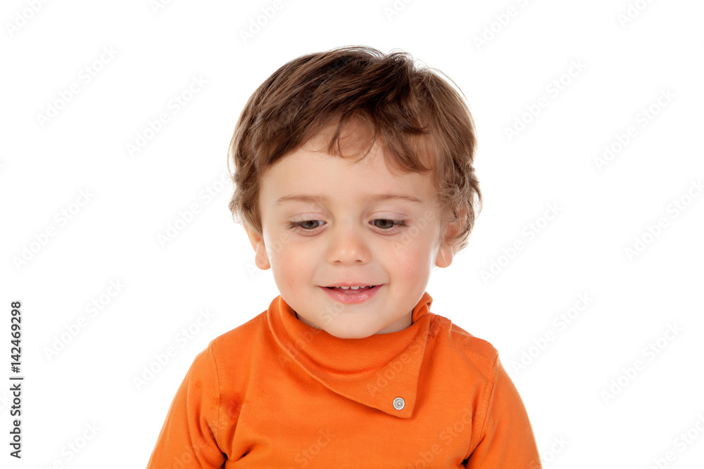 Beautiful little child two years old with orange jersey Beautiful little child two years old with orange jersey
